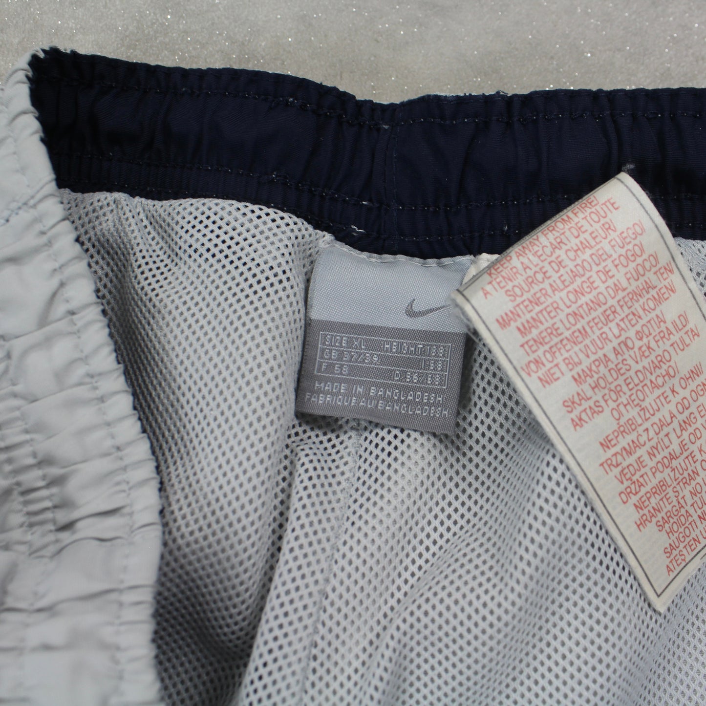 SUPERSELTENE Baggy-Trainingshose von Nike aus den 2000ern, Grau – (L)