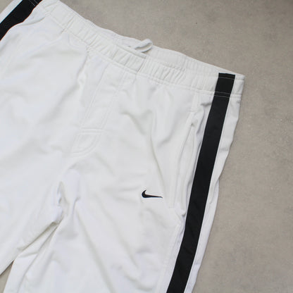 SUPERSELTENE Baggy-Trainingshose von Nike aus den 2000ern, weiß – (L)